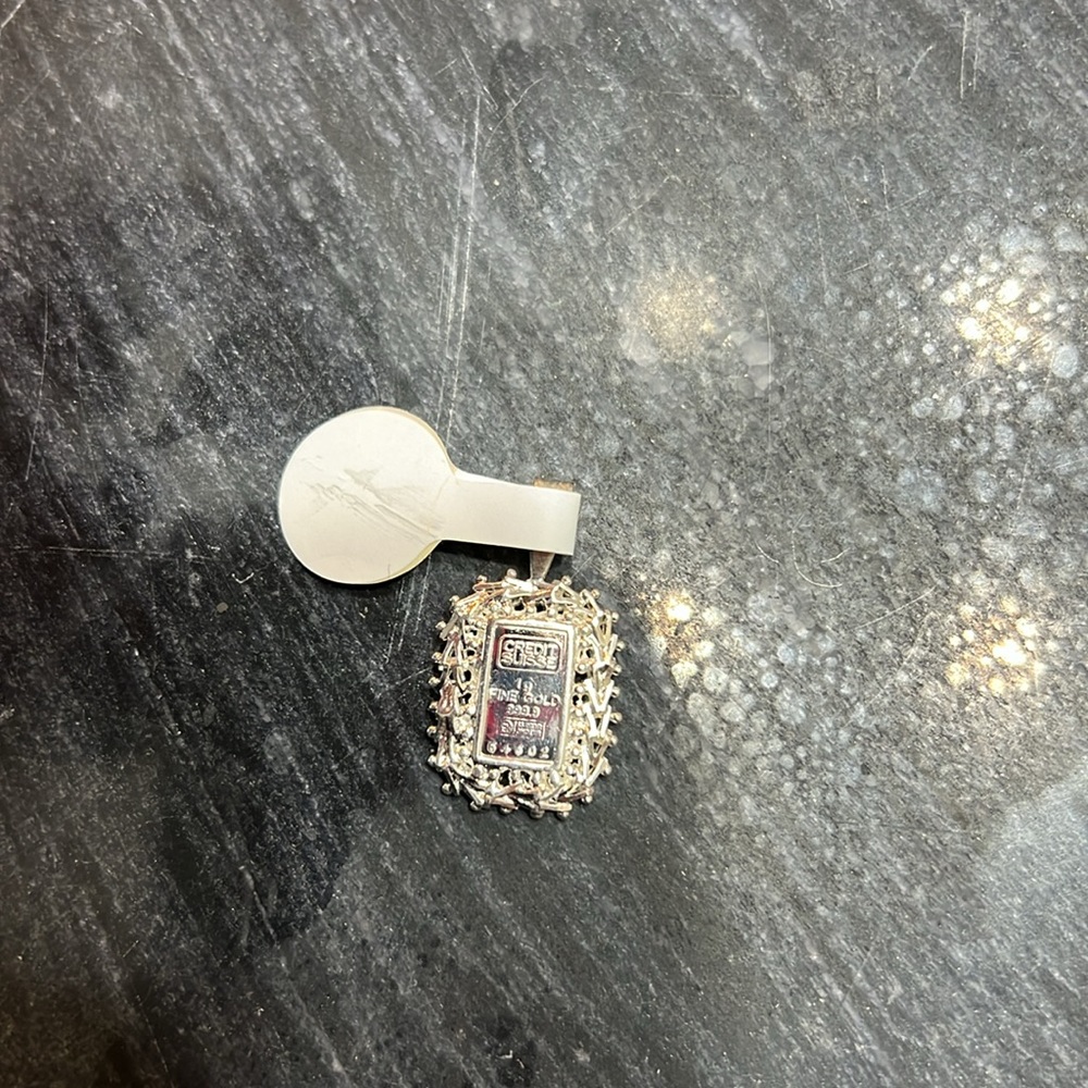 Silver credit pendant